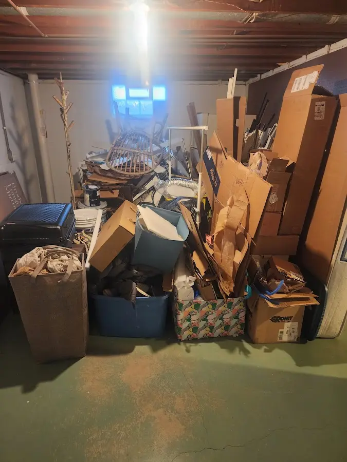 Roll-off dumpster container at job site for Cleanout Dumpster Rental in Peabody